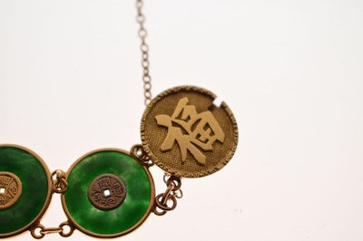Lot 65 - Chinese jade and yellow metal 'coin' bracelet, Wang Hing, Hong Kong