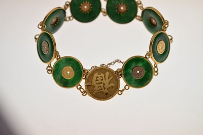 Lot 65 - Chinese jade and yellow metal 'coin' bracelet, Wang Hing, Hong Kong