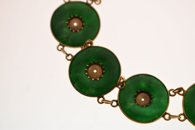 Lot 65 - Chinese jade and yellow metal 'coin' bracelet, Wang Hing, Hong Kong