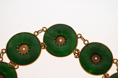 Lot 65 - Chinese jade and yellow metal 'coin' bracelet, Wang Hing, Hong Kong