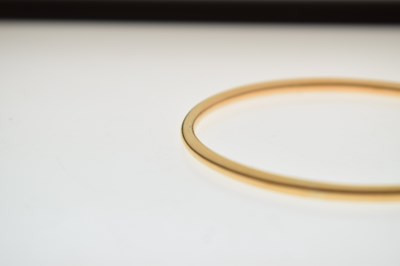 Lot 57 - Eastern high carat yellow metal bangle
