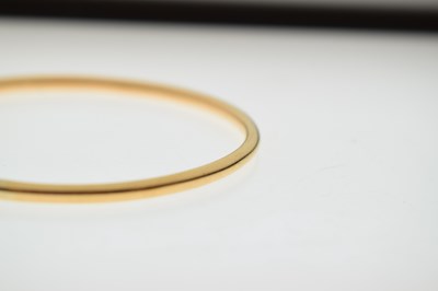 Lot 57 - Eastern high carat yellow metal bangle