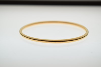 Lot 57 - Eastern high carat yellow metal bangle