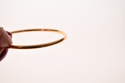 Lot 57 - Eastern high carat yellow metal bangle