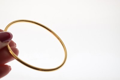 Lot 57 - Eastern high carat yellow metal bangle