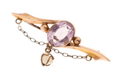 Lot 95 - Amethyst and baroque pearl brooch