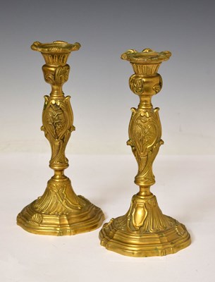 Lot 247 - Pair of 19th century French cast bronze candlesticks