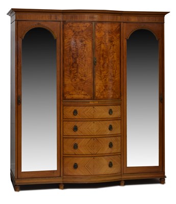 Lot 519 - Edwardian satinwood bow-breakfront wardrobe