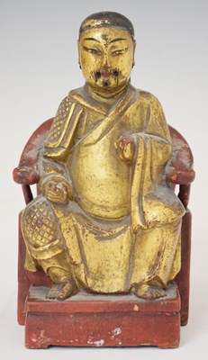 Lot 664 - Small 19th century Chinese Qing dynasty gilt and red lacquer wooden figure