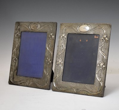 Lot 154 - Pair of Edwardian Art Nouveau silver photograph frames