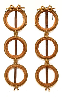 Lot 493 - Pair of giltwood and gesso triple circular frames