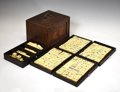 Lot 330 - Early 20th century oak-cased Mah Jong set