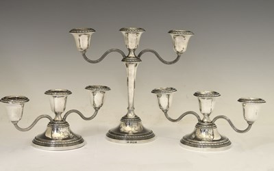 Lot 160 - Hong Kong Police Force - A suite of Elizabeth II silver candelabra