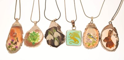Lot 117 - Wendy Sabine - Six painted hardstone silver mounted pendants
