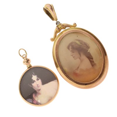 Lot 118 - Two yellow metal framed photographic pendants