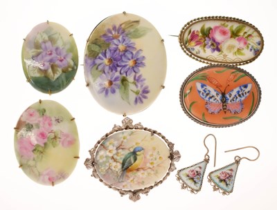 Lot 295 - Six ceramic brooches and pair of earrings