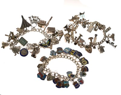 Lot 178 - Three silver charm bracelets