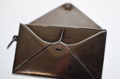 Lot 357 - Early 20th century novelty white-metal stamp case in the form of an envelope, etc