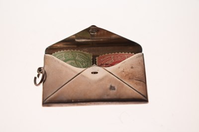 Lot 357 - Early 20th century novelty white-metal stamp case in the form of an envelope, etc