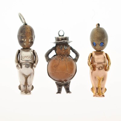Lot 237 - Two Great War era 'Fumsup' charms and a John Bull charm