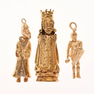 Lot 235 - Three 9ct gold charms - Two articulated (Merlin and Knight) plus a King