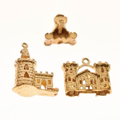 Lot 236 - Three 9ct gold charms - Castles