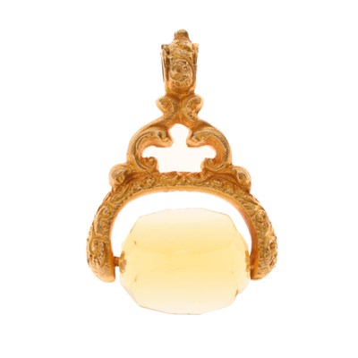 Lot 240 - Yellow metal (18ct) and citrine swivel fob seal