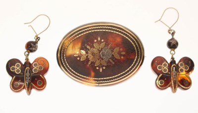 Lot 108 - Tortoiseshell and pique work oval brooch