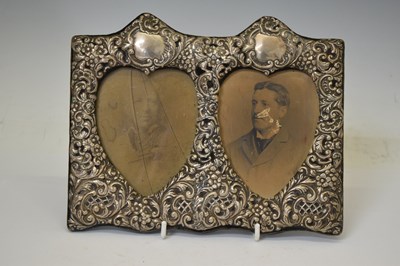 Lot 282 - Late Victorian silver 'double heart' photograph frame