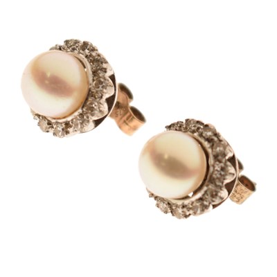 Lot 231 - Pair of pearl, diamond and white metal stud earrings