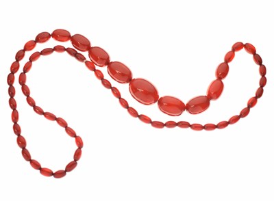 Lot 166 - Early 20th century graduated string of bakelite 'cherry amber' beads