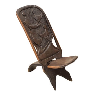Lot 528 - African carved hardwood two-piece low chair