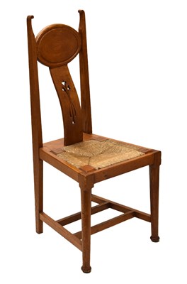 Lot 776 - Early 20th century Arts and Crafts rush seated golden oak chair