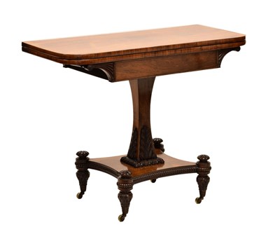 Lot 512 - William IV carved rosewood fold-over pedestal card table
