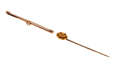 Lot 82 - Two diamond set brooches/stickpin