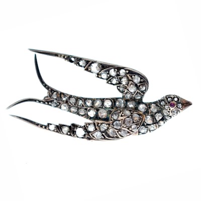 Lot 34 - Victorian diamond and ruby swallow brooch