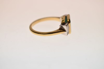 Lot 23 - Emerald and diamond 18ct yellow gold and white gold set three stone ring