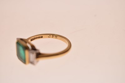 Lot 23 - Emerald and diamond 18ct yellow gold and white gold set three stone ring