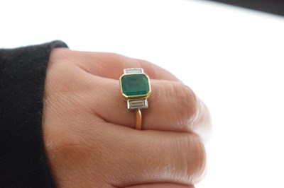 Lot 23 - Emerald and diamond 18ct yellow gold and white gold set three stone ring