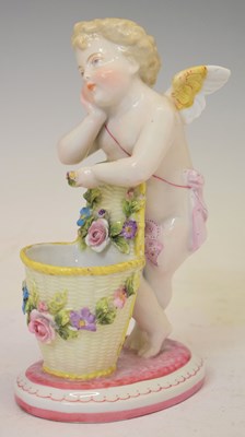 Lot 667 - Continental putto spill vase