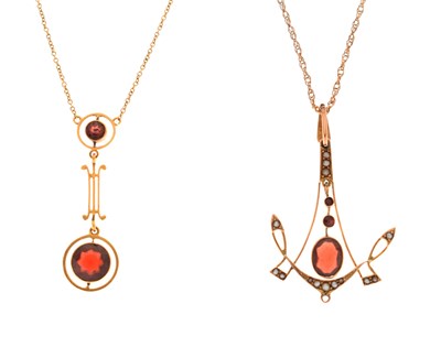 Lot 161 - Two early 20th century garnet set pendant necklaces