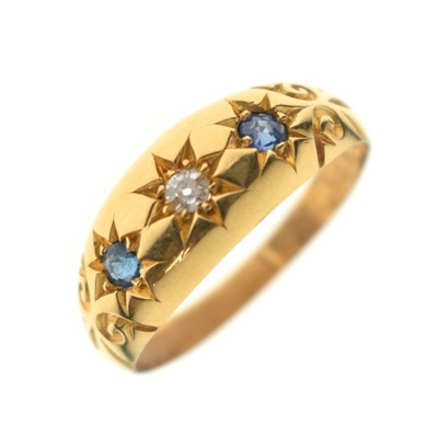 Lot 16 - Early 20th century gypsy-set sapphire and diamond three-stone 18ct gold ring
