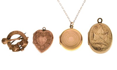 Lot 254 - Small group of lockets comprising a Scottish '9ct' yellow metal brooch, etc