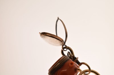 Lot 69 - 19th century coral bull head fob seal and others