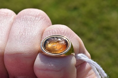 Lot 67 - Chalcedony intaglio yellow metal signet ring, possibly Roman