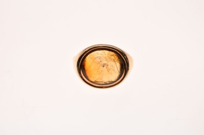Lot 67 - Chalcedony intaglio yellow metal signet ring, possibly Roman