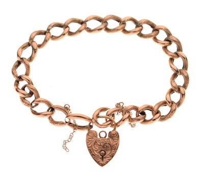 Lot 186 - Curb link bracelet having foliate engraved decoration and stamped '9c'
