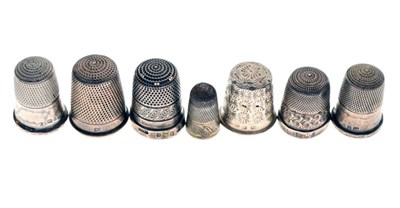 Lot 138 - Seven various silver and white metal thimbles