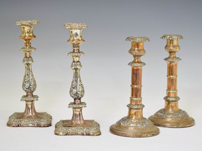 Lot 497 - Two pairs of old Sheffield plate candlesticks