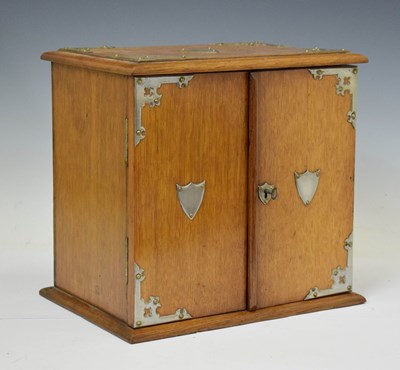 Lot 451 - Edwardian smokers oak table cabinet